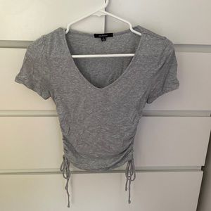 flattering v-neck side adjustable grey top